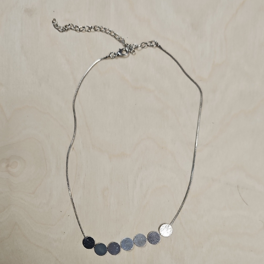 Elegant Silver Necklace with Disc Accents